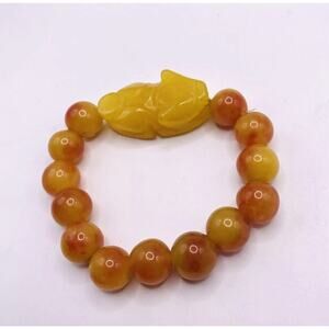 Vintage Orange/yellow or Carmel color Jade Bracelet with Carved Animal J3